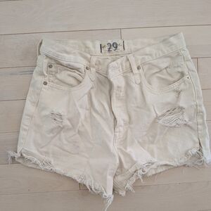 We The Free Distressed Cream Denim Shorts
